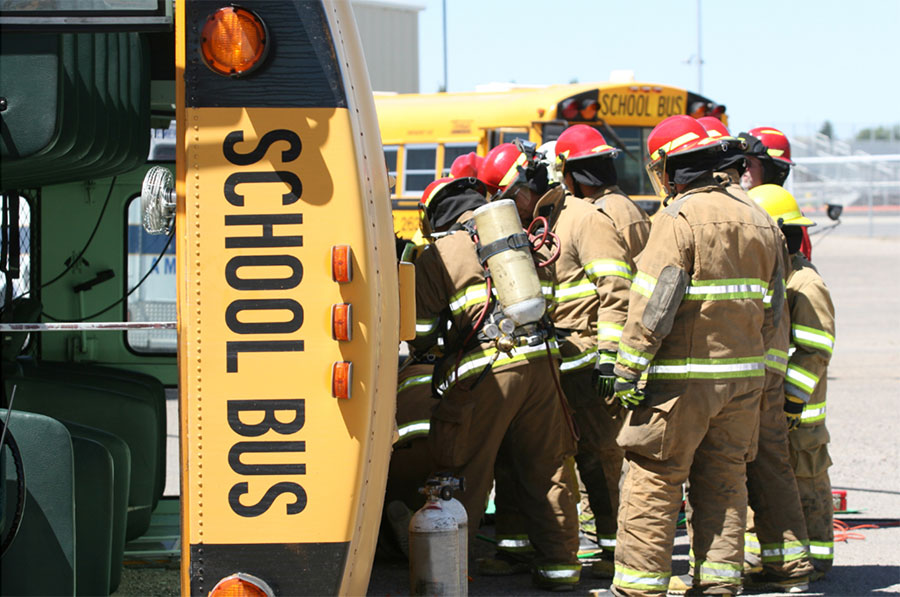 School Bus Case photo of firemen at accident