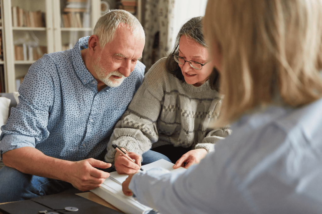 woman helping man with paperwork as a power of attorney